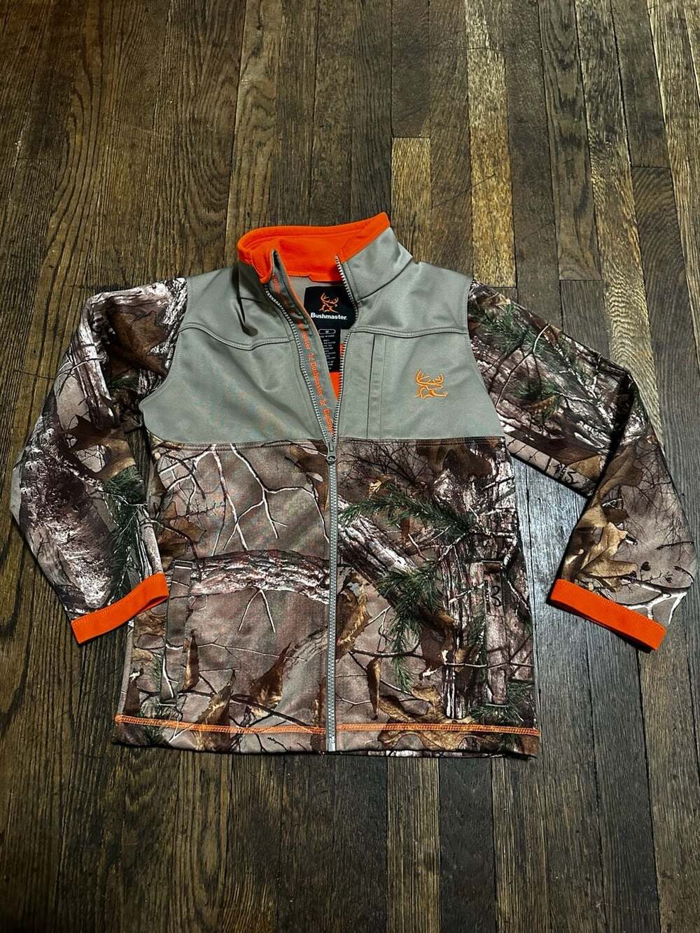 BOYS MEDIUM CAMO HUNTING JACKET BUSHMASTER REAL TREE